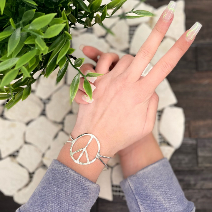 Silver Peace Sign Cuff Bracelet model