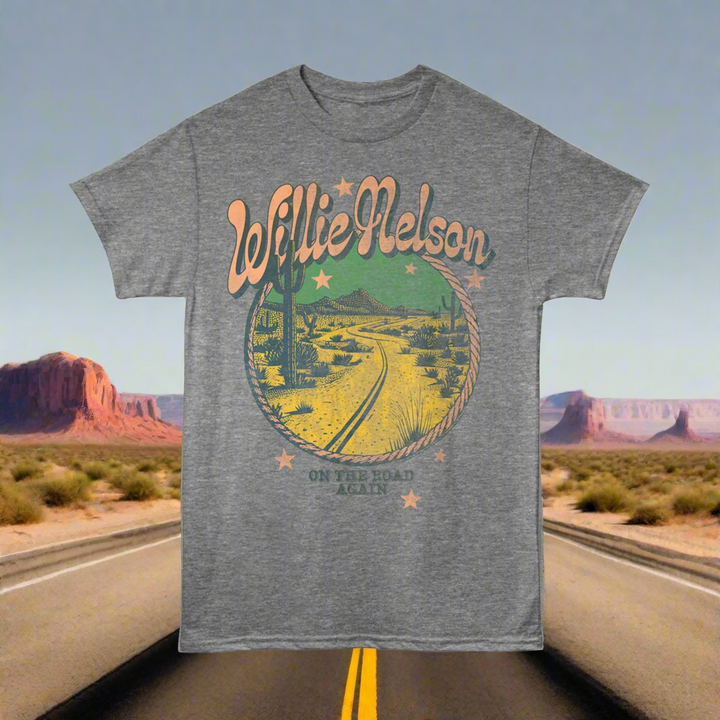 Gray t-shirt with Willie Nelson graphic design on a desert road background